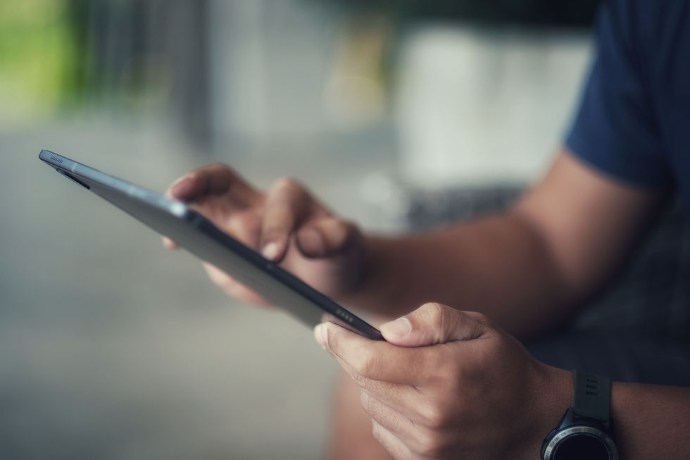 Person holding a tablet