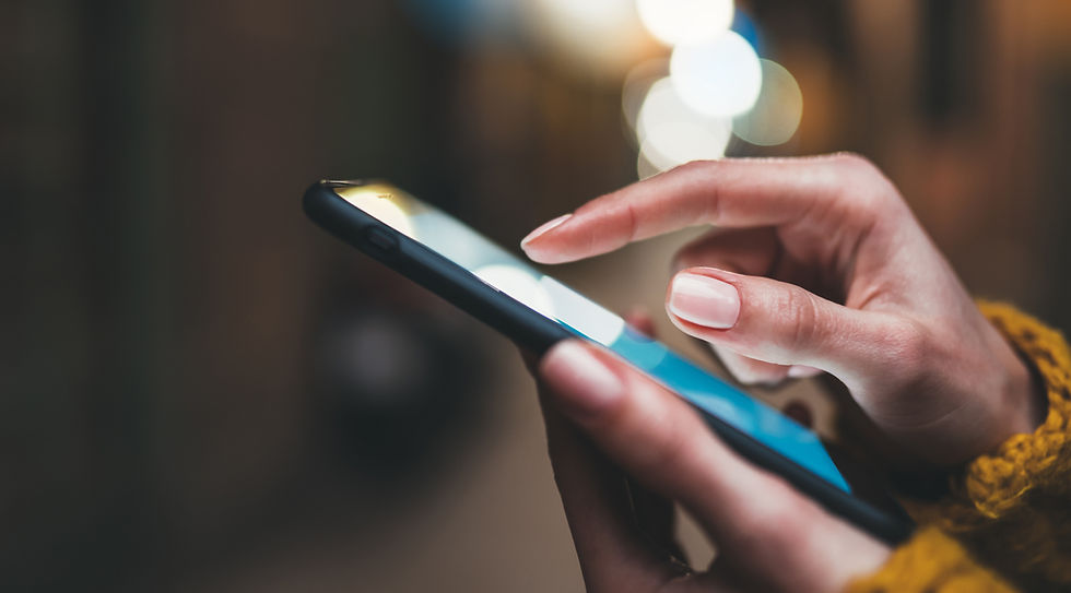Hand holding a mobile device