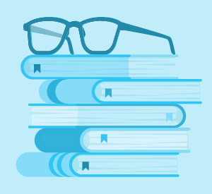 Eye glasses on a stack of books