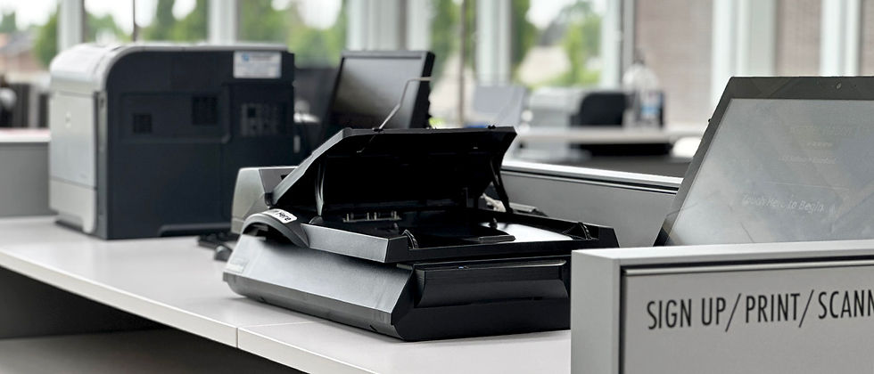 Copiers and printers on a table at the Weber County Library