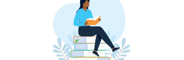person sitting on books